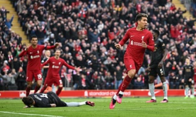 Roberto Firmino celebrates after scoring during the Premier League match between Liverpool and Arsenal at Anfield on 9 April 2023